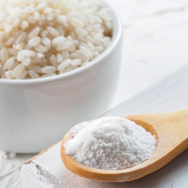 ¿Cuánto equivale 100 gramos de arroz en tazas?