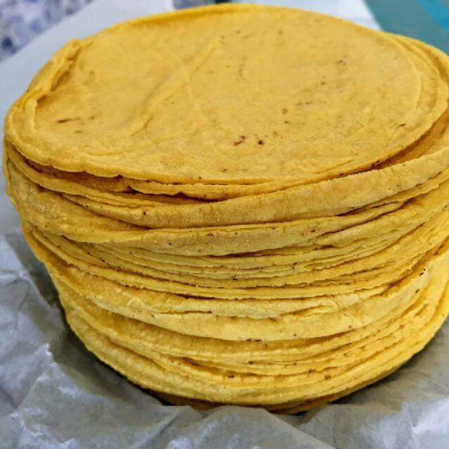 ¿Cuánto es 100 gramos de tortilla?